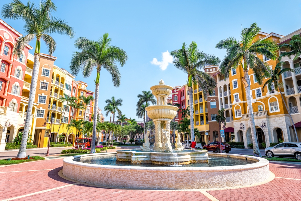 Downtown Naples Florida fountain surrounded by colorful buildings